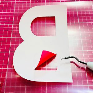 How to weed away Cricut Iron-On Monogram image