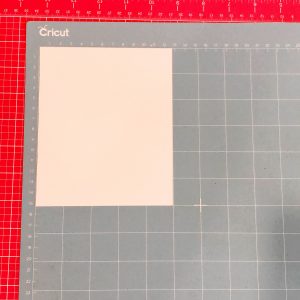 Correct orientation and placement of Cricut Iron-On located on Cricut Cutting Mat