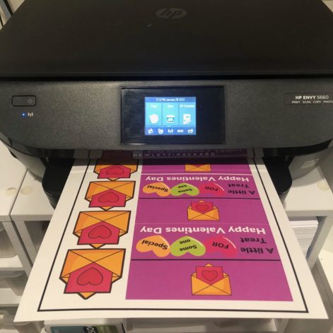 Printer showing printable treat toppers being printed