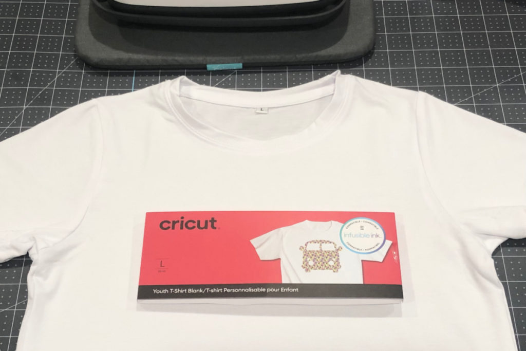Cricut sublimation t-shirt with package label placed on front