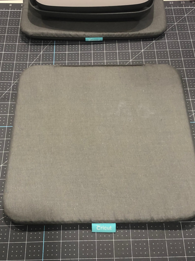 Cricut Easy Press 12x12 mat on top of desk